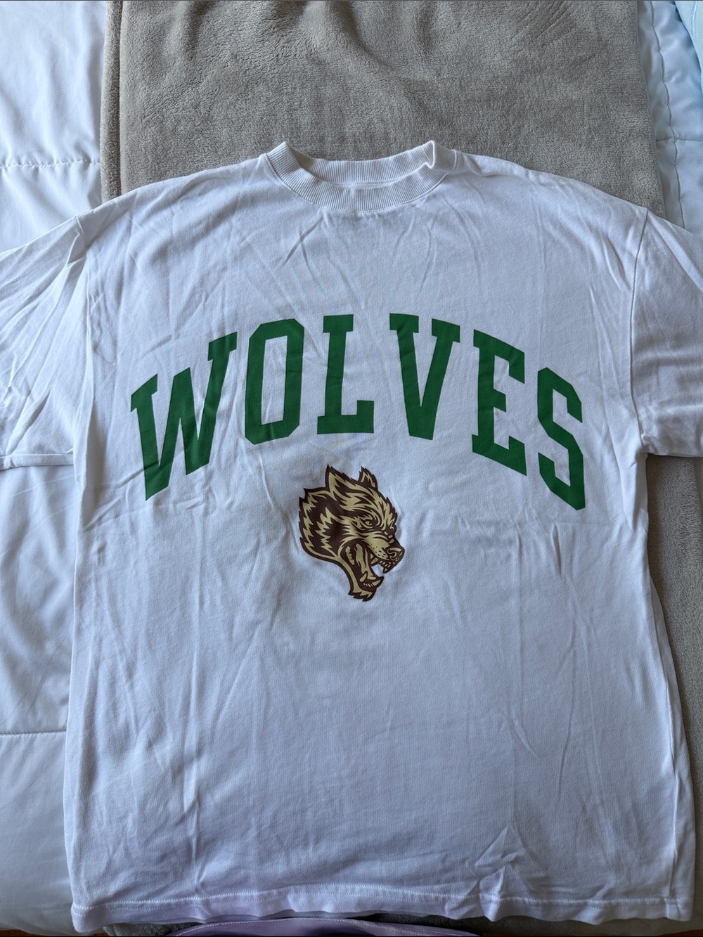 Darc Sport White "WOLVES" Graphic Tee with Green Lettering and Brown Wolf Logo